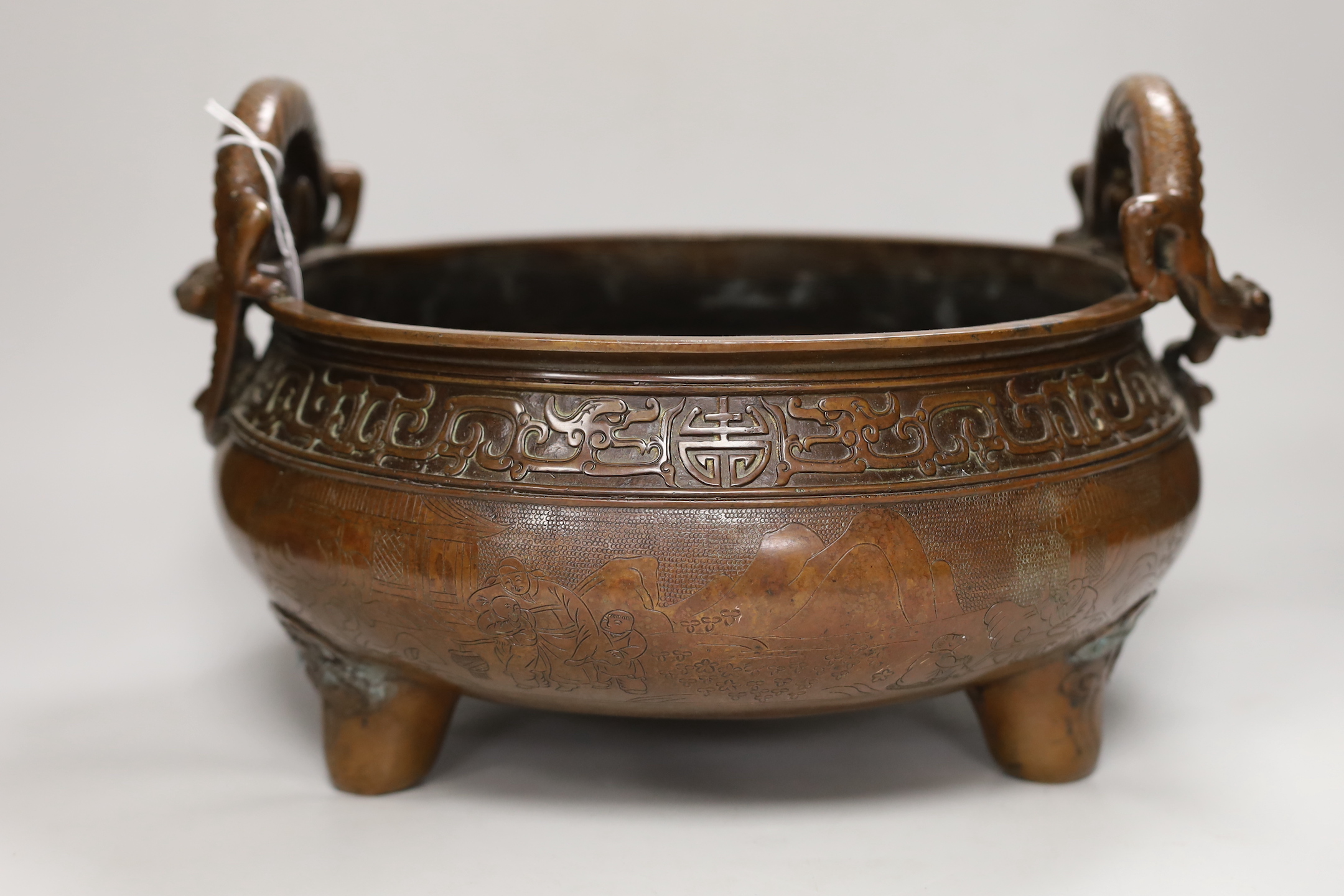 A massive Chinese brown patinated bronze ding censer, with dragon handles, 23.5cm including handles high